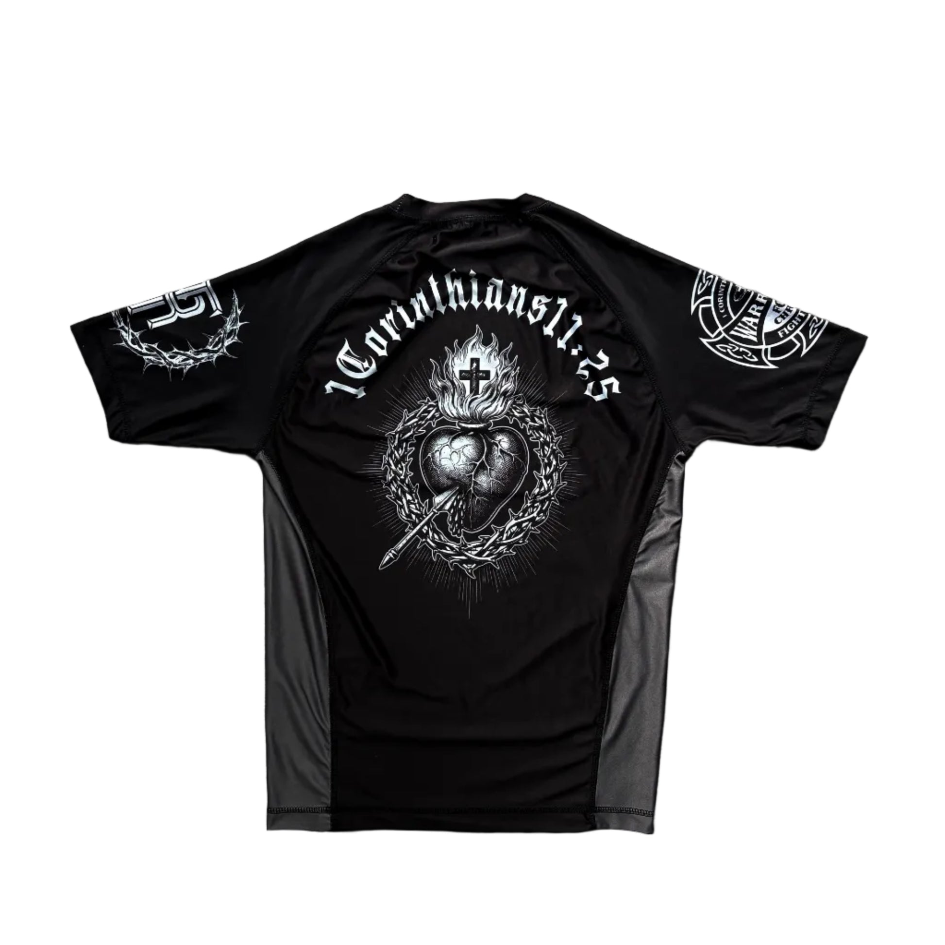 Black t-shirt with white graphic design on a wooden surface