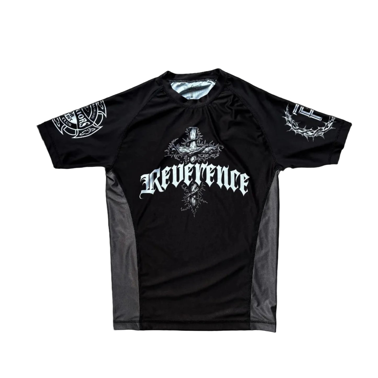 Black t-shirt with 'Reverence' text on a wooden surface